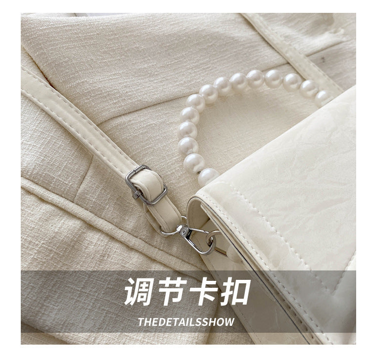 Trendy and Sophisticated Niche Handbags for Women, Popular in 2025 Summer, New Pearl Design Small Tote and Crossbody Bag
