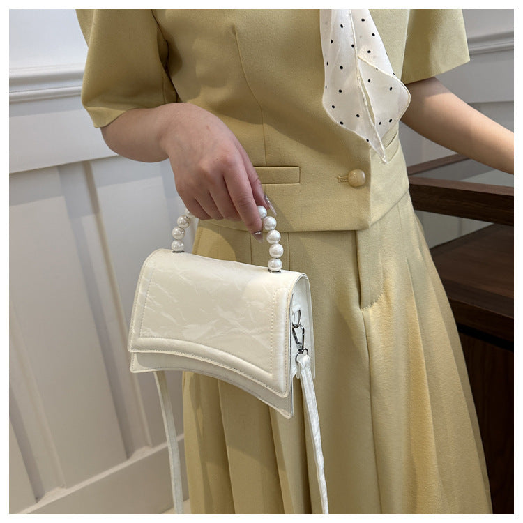 Trendy and Sophisticated Niche Handbags for Women, Popular in 2025 Summer, New Pearl Design Small Tote and Crossbody Bag